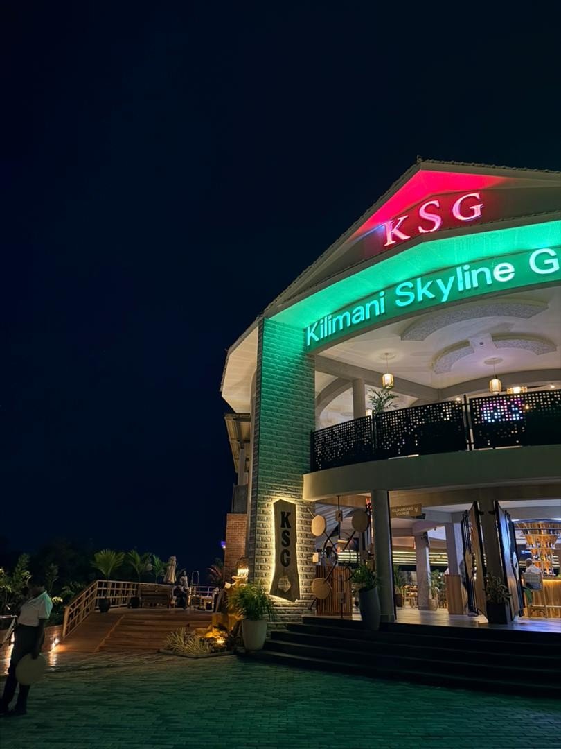 Neon-lit KSG facade at night